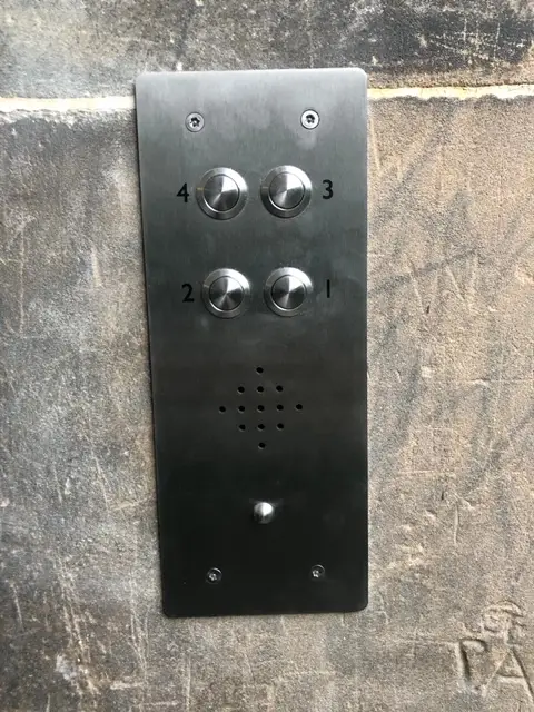 Simple silver residential door entry intercom in Edinburgh home. Installed by Safe Simple Secure